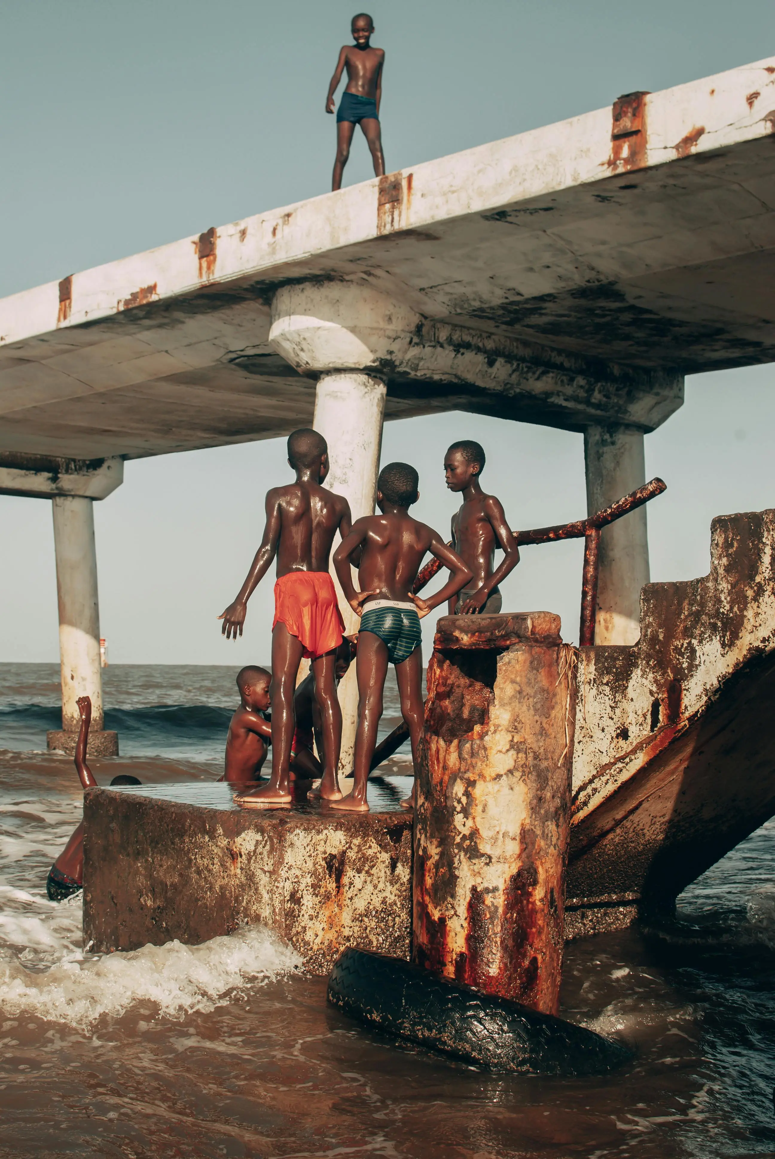 A photo of a group of guys at the beach